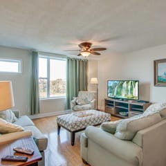 Second-floor condo with river views and access to a community pool
