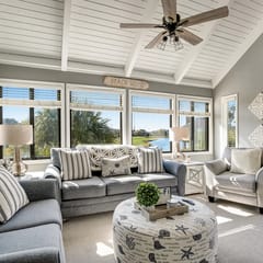 Stylish beach villa with three decks, and golf course views
