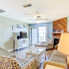 2-story riverfront condo with 2 balconies, outdoor pool, grills, river views, AC