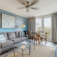 Third floor home with stunning private-deck ocean views - steps from beach