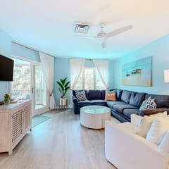 Two-story condo near beach with on-site pool & screened deck