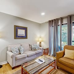 Renovated lagoon-view condo with screened porch & WiFi - steps from the beach