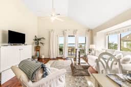 2nd floor villa with water views, lovely balcony & w/d - walk to Beach Club