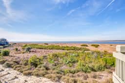 Beach villa with full kitchen, ocean/inlet views - short walk to Beach Club