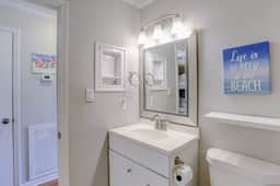 Beachfront condo with pool, beach access, pier, private balcony, & central AC
