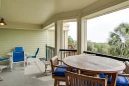 Beachfront villa w/ ocean views, private deck, pool access – steps from beach