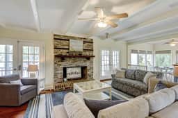 Beautiful home on lush lot with boardwalk to marsh, large deck, wifi, central ac