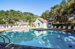 Beautifully decorated cottage steps from the beach with pool & open layout