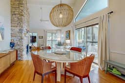 Bright, beautiful home with screened-in porch, wood flooring, & AC - dogs ok