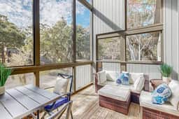 Bright, beautiful home with screened-in porch, wood flooring, & AC - dogs ok