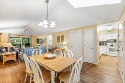 Charming Island Getaway with a Furnished Deck Offering Forest & Fairway Views