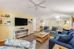 Charming Island Getaway with a Furnished Deck Offering Forest & Fairway Views