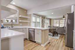 Charming home steps from beach with two full kitchens, deck, patio, WiFi & AC