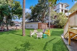Charming home with enclosed porch, WiFi, & central AC - walk to beach and shops