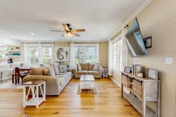 Charming home with enclosed porch, WiFi, & central AC - walk to beach and shops