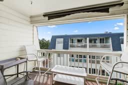 Comfortable villa one row away from the beach w/shared pool & grills