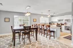 Convenient dog-friendly retreat steps from the beach with grill & screened porch