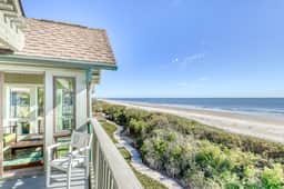 Dog-Friendly Waterfront Condo with Furnished Deck & Beach Views