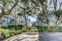 Dog-Friendly Waterfront Condo with Furnished Deck & Beach Views