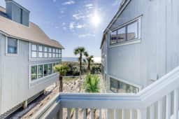 Dog-Friendly Waterfront Condo with Furnished Deck & Beach Views