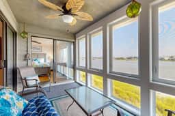 Elegant riverfront condo with access to private W/D, central AC, and pool access