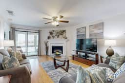 Elegant riverfront condo with access to private W/D, central AC, and pool access