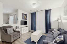 Fully-furnished first-floor condo with pool & private washer/dryer- dog-friendly