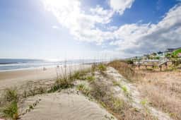 Golf course-front condo with beach access, golf views, outdoor pool, tennis, W/D