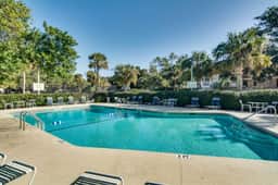 Golf course-front condo with beach access, golf views, outdoor pool, tennis, W/D