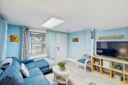 Ground-floor duplex steps to beach with screened porch & WiFi