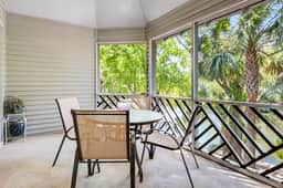 Lagoon view, second floor villa w/ screened in porch, short walk to the beach