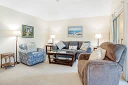 Lagoon view, second floor villa w/ screened in porch, short walk to the beach