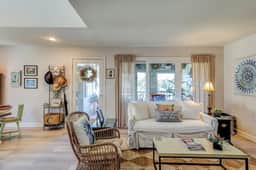 Lovely condo near beach with enclosed porch, pool, tennis, and golf access