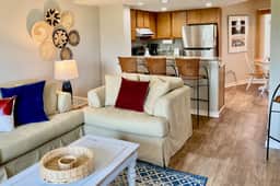 Lovely top floor villa in Wild Dunes with partial ocean views, pool, & W/D