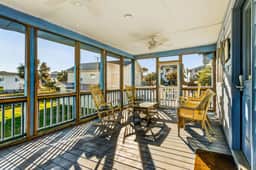 Marsh-view home with large rooftop deck & outdoor shower - steps from beach
