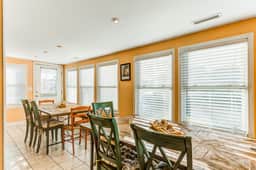 Marsh-view home with large rooftop deck & outdoor shower - steps from beach