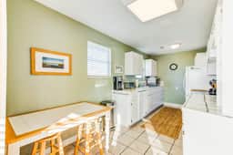 Marsh-view home with large rooftop deck & outdoor shower - steps from beach