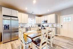 Modern cottage with all-new interior, patio, AC, & W/D - near beaches & golf