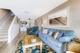 Newly renovated two-story waterfront condo with screened porch, pool, & tennis