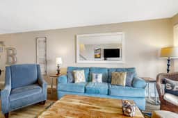 Newly renovated two-story waterfront condo with screened porch, pool, & tennis