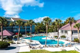 Newly renovated two-story waterfront condo with screened porch, pool, & tennis