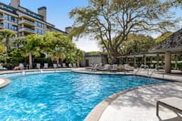 Oceanfront condo on the beach with shared pool, hot tub, & gorgeous decor