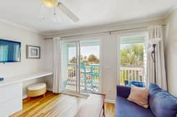 Oceanfront condo with water views, pool, balcony, & easy beach access
