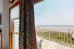 Oceanfront home with stunning ocean views, central AC, and private W/D
