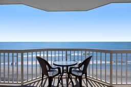 Oceanfront, third-floor villa with great views, balcony & 2 shared pools