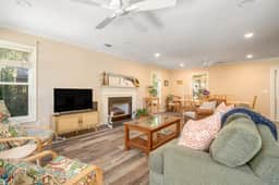 Palmetto-lined home with porches, yard & hammock - walk to beach/town