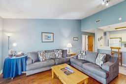 Quaint top floor lagoon view condo w/ community pool access - walk to the beach