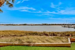 Riverfront condo near Folly Beach with balcony, views, outdoor pool & tennis