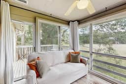 Riverfront condo w/ shared pool plus access to tennis & gym