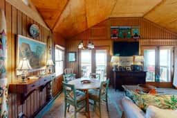 Rustic oceanfront home with screened porch, free WiFi, deck, & beach access